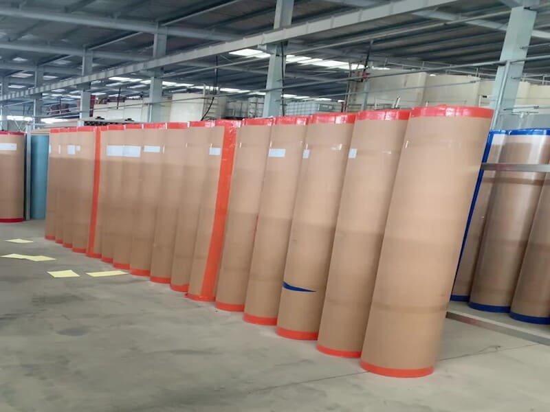 forklift driving down a warehouse aisle on PVC flooring